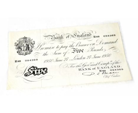 A Bank of England June 27th 1950 'White Fiver', Percival Spencer Beale Cashier, R88 094369. CONDITION REPORT The note has bee