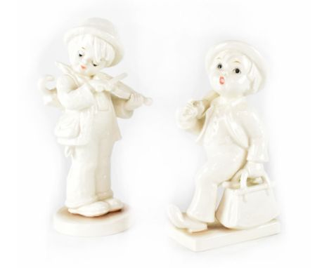 Two Goebel boy figures from the 'Expression of Youth' series, signed to the base and dated 1991, height of largest 20.5cm (2)