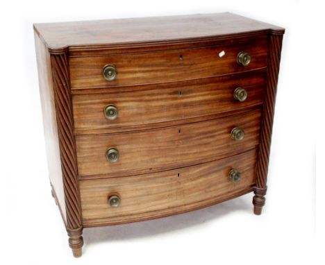 A 19th century mahogany bow-fronted chest of four graduated drawers with wrythen twist pilasters and brass handles, height 92