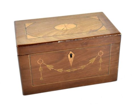 A Regency inlaid mahogany tea caddy, with two interior compartments, length 22cm, width12cm. CONDITION REPORT The outside is 