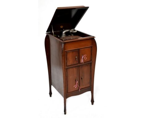 A Craneophone mahogany-cased gramophone with spare Daptacon diaphragm, the case with integral speaker above a cupboard for re
