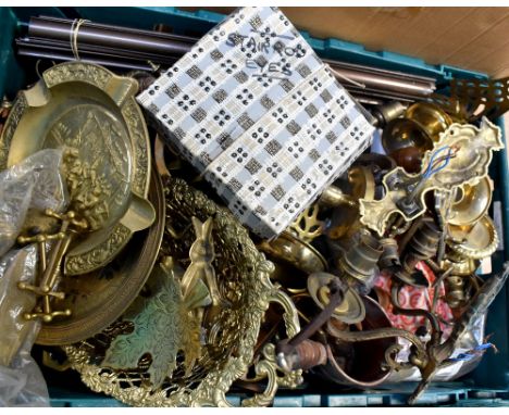 A quantity of predominantly brass items to include candlesticks, light fittings, fireside accessories, etc.