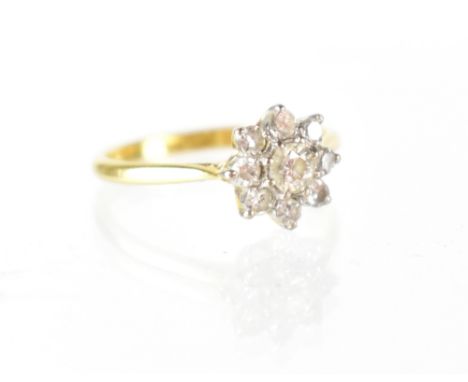 A Boodle & Dunthorne 18ct yellow gold diamond floral cluster ring, size O, approx 2.7g. CONDITION REPORT Clear hallmarks and 