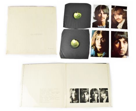 The Beatles 'White Album', first pressing Mono. CONDITION REPORT Records hardly played but has long pressing mark on Side 2, 