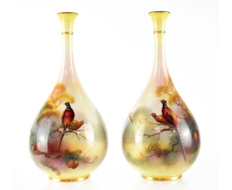 A pair of Royal Worcester vases of gourd form, hand painted with pheasants by Albert Shuck, signed, gilt highlights, green ma