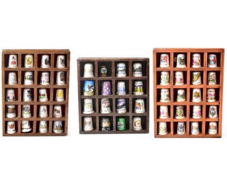 A large quantity of mainly ceramic thimbles to include tourist examples, Cunard 'Caroni' example, floral examples, etc, all i