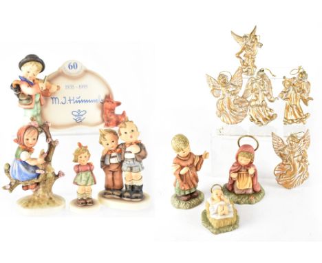 A boxed Hummel three-figure Nativity set, Joseph, Mary and the infant Jesus, a Hummel '60 Year Anniversary' plaque 1935-1995,