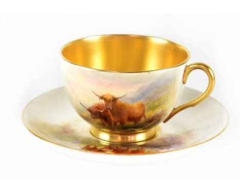 A Royal Worcester cabinet cup and saucer, both hand painted with cattle by Harry Stinton, signed, gilt highlights, puce mark 