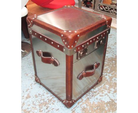 TRUNK in polished steel with leather edging, 40cm x 40cm x 57cm high. 