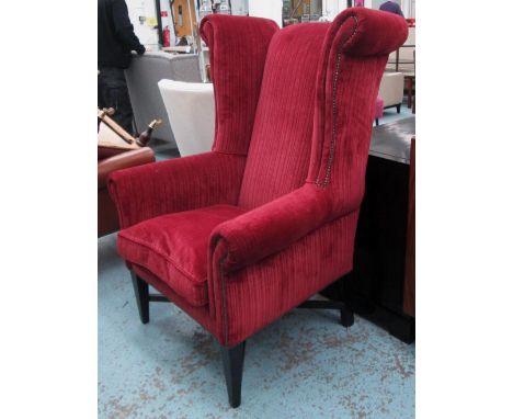 WING ARMCHAIR, contemporary ebonised in red chenille with cushion seat, 133cm H x 96cm.