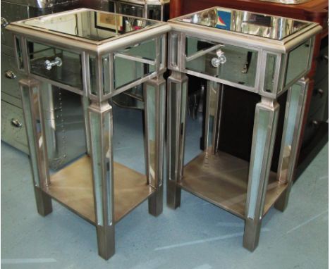 MIRRORED SIDE TABLES, a pair, with drawer and shelf below on square supports, 42cm x 32cm x 75cm H. (2)