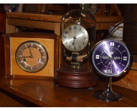 Eight hundred day clock beneath a glass dome, a Smiths mantel clock and a Westclox 1952-1977 Silver Jubilee chrome finish man