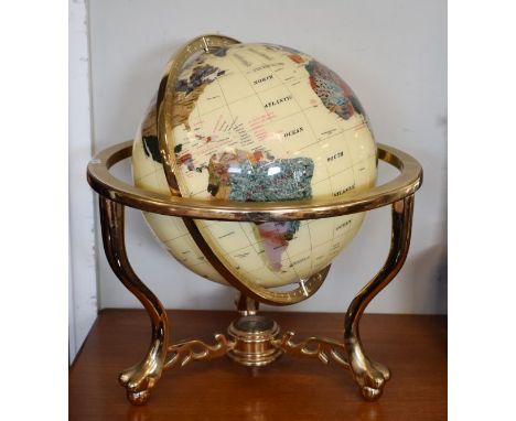 Modern terrestrial globe, the nations inset in various coloured hardstones, in a brass finish stand   Condition: 