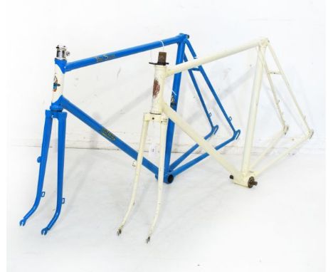 Vintage racing cycle frames comprising:  Sun frame in blue, with white head tube and gold decals, having brazed-on mudguard e