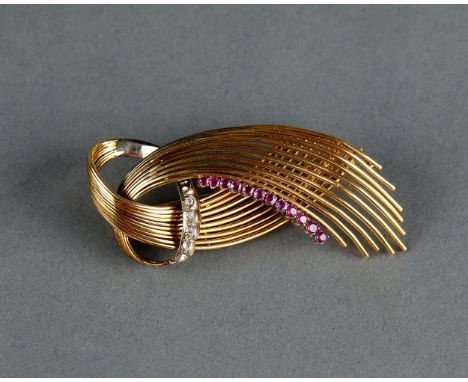 Italian Ruby and Diamond brooch in 18k gold. Deep red round-shaped Rubies contrasting beautifully with round Diamonds.Marked 