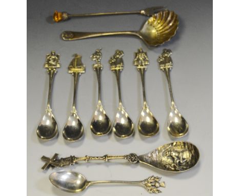 Silver  - a set of six Dutch silver teaspoons, 59.4g; a silver coloured caddy spoon embossed with an interior scene, Windmill