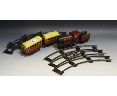 Toys - O gauge first class carriage; another; clock work 040 loco, with fender, two carriages, loose tracks; etc (1 box)