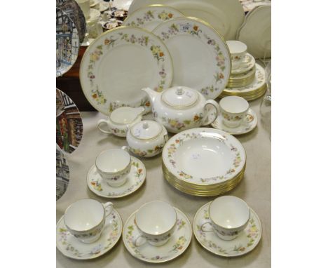 A Wedgewood Mirabelle tea and dinner service for 6 comprising tea pot, milk, sugar, tea cups,saucers, side plates, tea plates