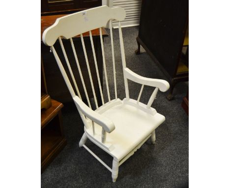 An early 20th Century painted stick back kitchen chair, spindle back splat, turned supports (shortened possibly from a rockin