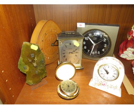 SELECTION OF QUARTZ WALL AND MANTEL CLOCKS TOGETHER WITH WIND UP TRAVEL CLOCK.