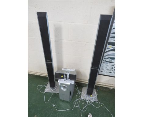 PANOSONIC SUB WOOFER, PAIR OF FLOOR STANDING SPEAKERS AND ONE OTHER SPEAKER.
