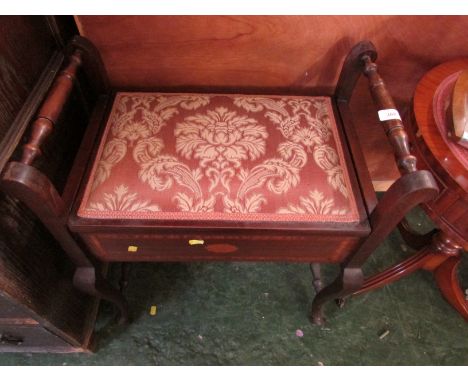 A MAHOGANY FRAMED PIANO STOOL WITH INLAY AND UPHOLSTERED SEAT.