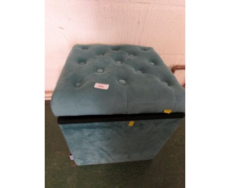 BLUE UPHOLSTERED FOOT STOOL.