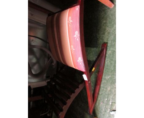 ADJUSTABLE ROCKING GOUT STOOL.