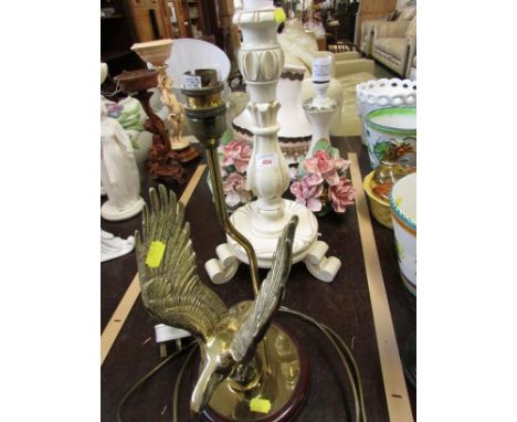 A PAIR OF FLORAL ENCRUSTED TABLE LAMPS, ONE OTHER TABLE LAMP AND SOME SHADES. (THREE NEED RE-WIRING)