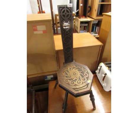 REPRODUCTION CARVED OAK SPINNING STOOL.