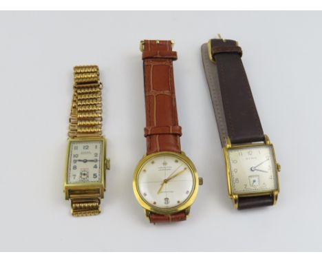 A Hamilton Pan-Europe automatic Swiss wrist watch with date marker and brown crocodile pattern leather, 23cm long; a Roamer s