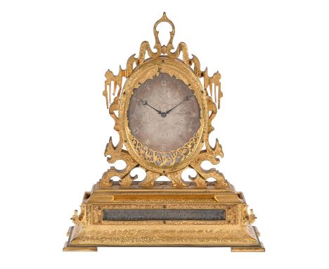 A fine Victorian engraved gilt brass mantel clock in the style of Thomas ColeUnsigned but probably by Edward Winter Robins, L