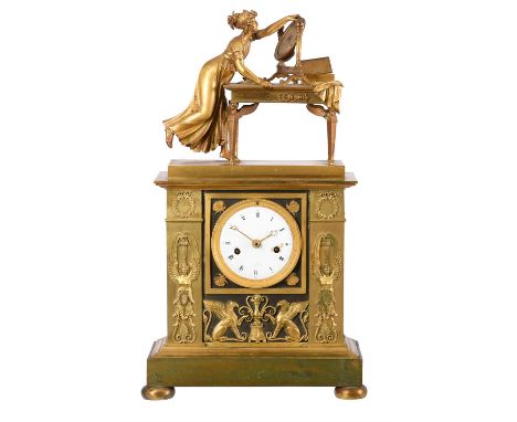 A fine French Empire ormolu and patinated bronze figural mantel clockUnsigned, in the manner of Jean Andre Reiche, Paris, ear