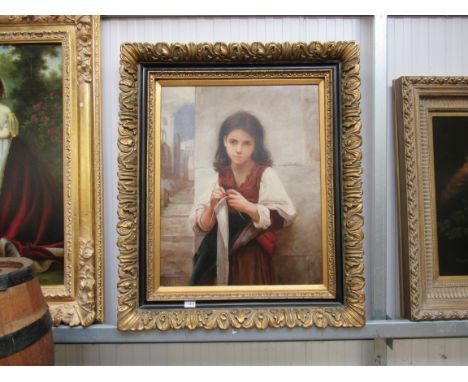 A modern gilt framed reproduction print of a child knitting 
