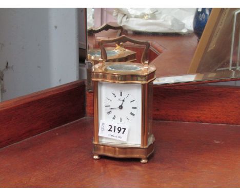 A brass carriage clock