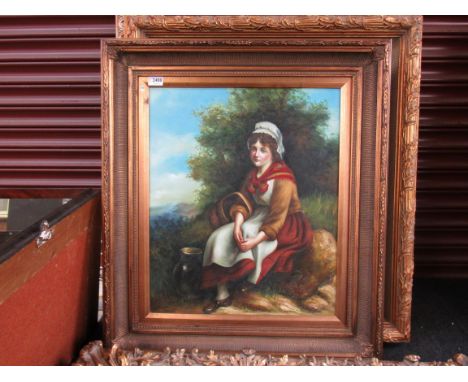 A modern gilt framed reproduction print depicting a seated girl