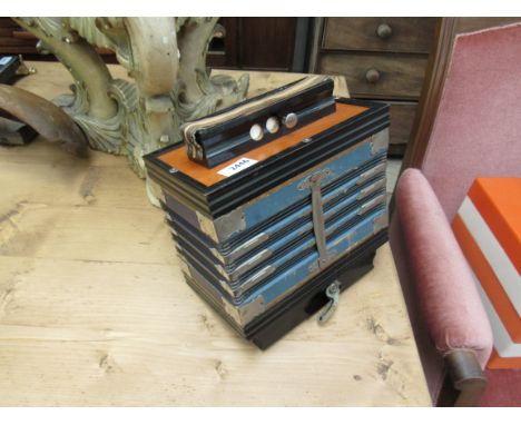 A 'Champion Band' button melodeon    