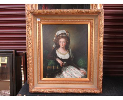 A modern gilt framed reproduction print of a seated early 20th Century lady 