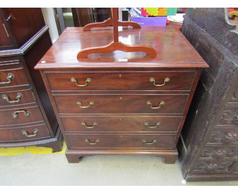 A George III mahogany cabinet, formerly a commode 