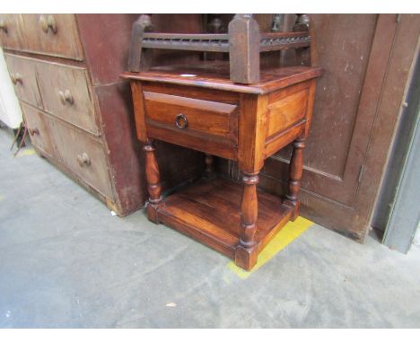 A fruitwood single drawer lamp table 