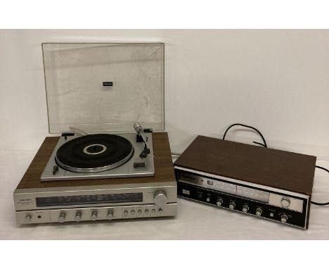 A vintage Toshiba sm-2100 stereo music system together with a Teleton F-2100 Hifi stereo.  