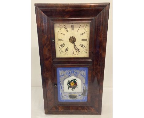 A 19th century American Jerome &amp; Co. New Haven Clock Co wooden cased wall clock.  Eight day clock with extra bushed movem