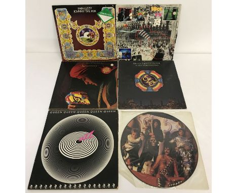 6 vintage rock music LP records to include "It's A Hard Life" picture disc by Queen.  Lot also includes ELO, 10CC, and Thin L