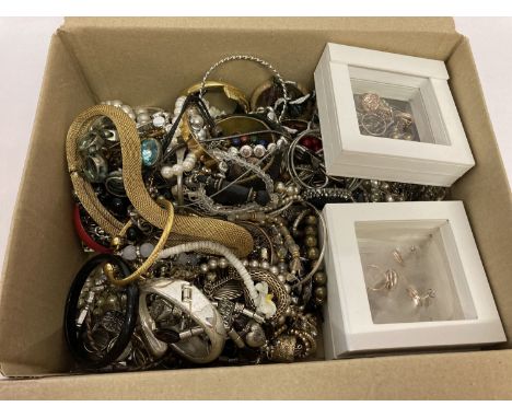 A box of mixed vintage and modern costume jewellery to include bracelets, bangles and necklaces.  