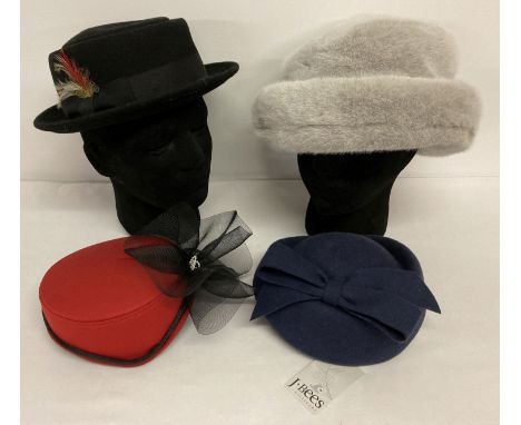 4 vintage and modern hats.  Comprising: a grey faux fur hat by Viyella, a handmade wool Pork Pie hat with feather detail to b