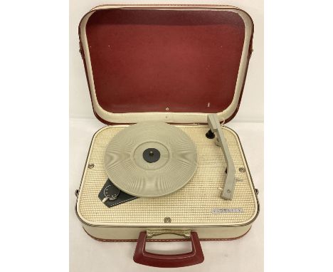A vintage Fidelity valve record player, HF31, in cream and red portable carry case.