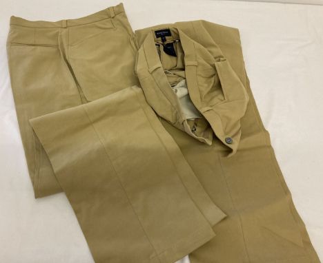 2 pairs of women's brushed cotton classic tan golf trousers by Burberry.  Both size 12 with iconic Burberry trim to inside of