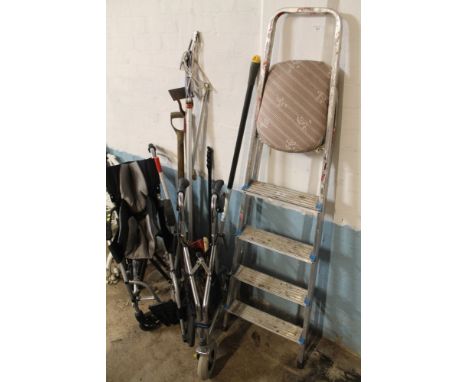 A QUANTITY OF ASSORTED TOOLS TOGETHER WITH A FOLDABLE WHEEL CHAIR, STEP LADDERS, ETC 