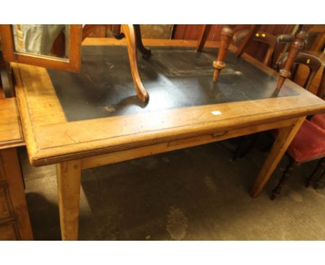 A LARGE OAK LEATHER TOPPED SINGLE DRAWER DESK 