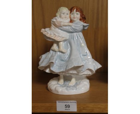A ROYAL WORCESTER FIGURE 'LOVE'